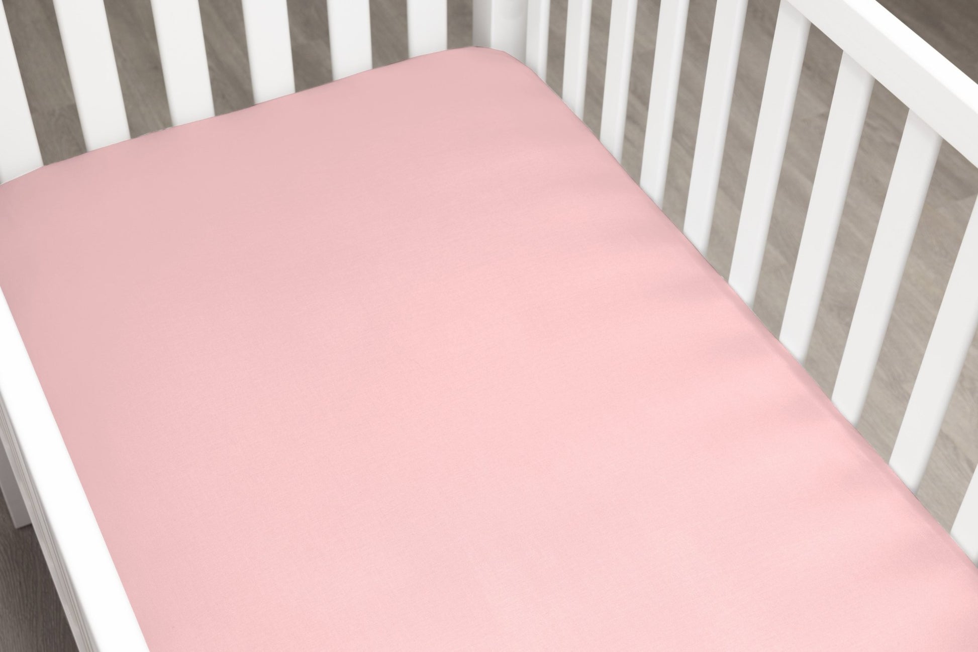 Solid Crystal Pink Crib Sheet - New Arrivals Inc